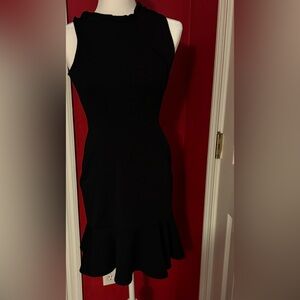 Adorable Blue dress hits below knee on most people. Great work dress